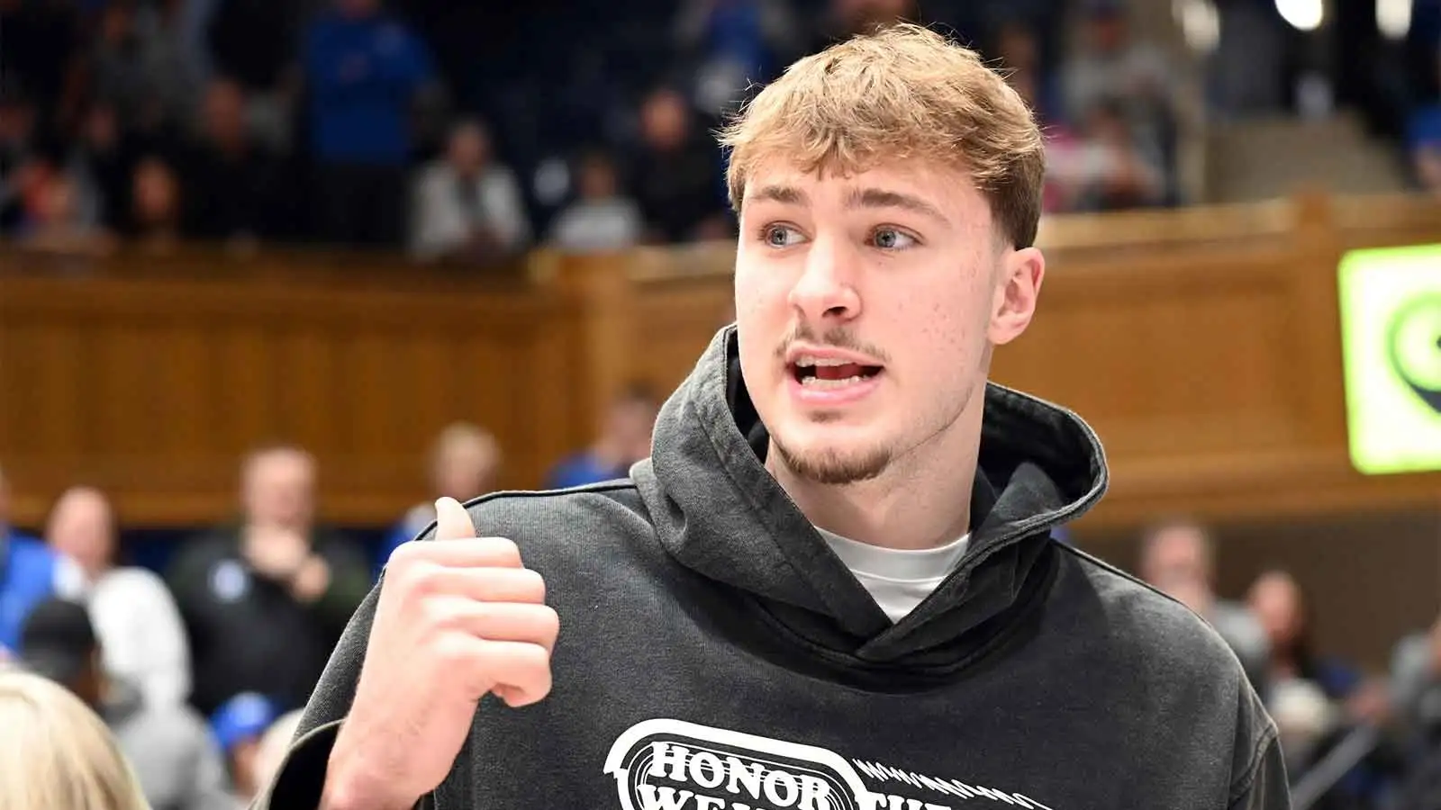 Cooper Flagg seen wearing boots while attending Duke game