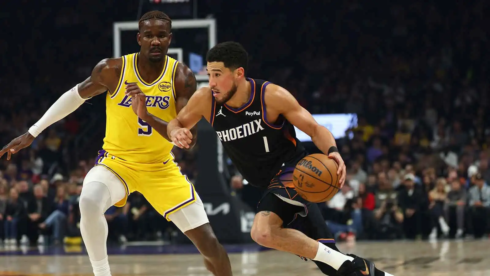 Devin Booker has a funny reaction to a fan asking him to join him in LA
