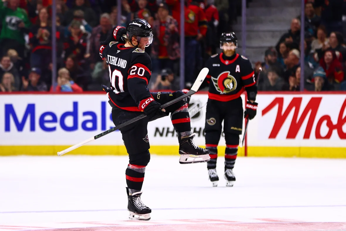 Senators score seven to beat Sharks