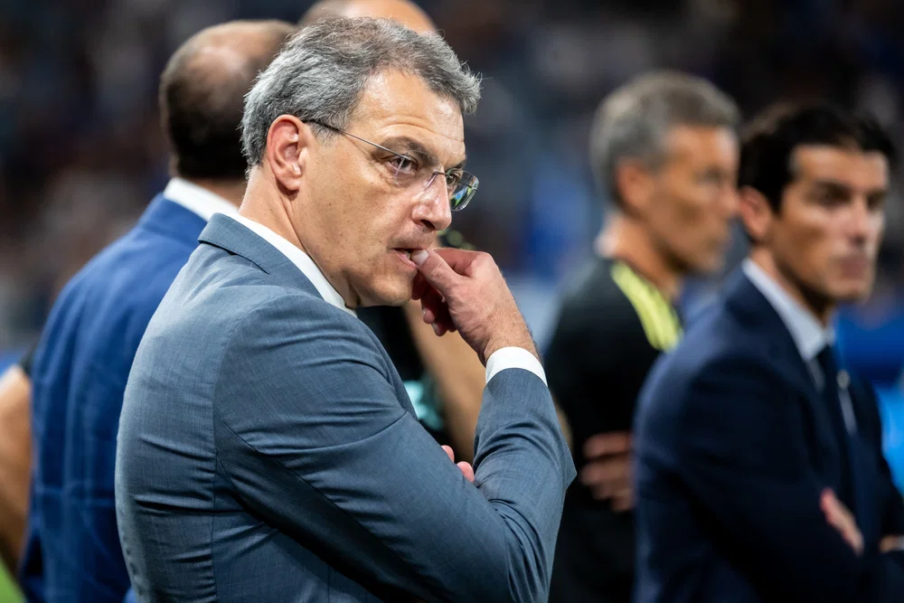 Director hints publicly with a smile about signing Liverpool and Man City stars this summer